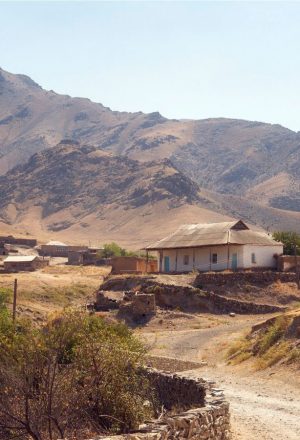 Cycling through a remote village whilst on the Uzbekistan Cycling Holiday