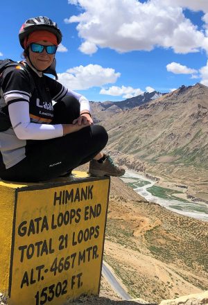 A cyclist at the end of the Gata Loops in the Indian Himalayas