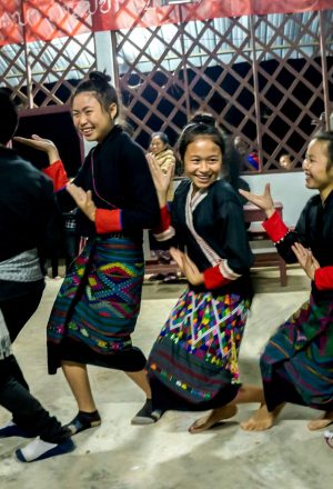 Laos Cycling Holiday - village dance performer
