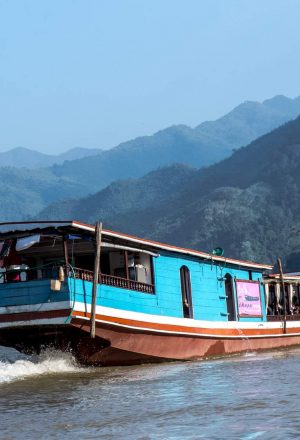 Laos Cycling Holiday - slow boat on the Mekong river