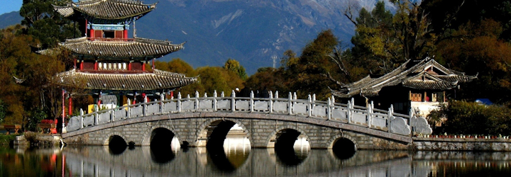 Stone bridges and intricately carved buildings in Lijiang Yunnan